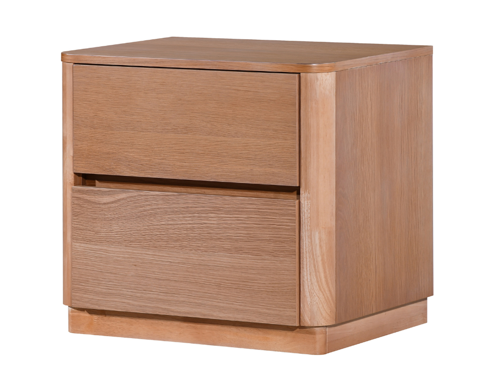 Oak bedside table with two drawers on a white background on a slight angle 
